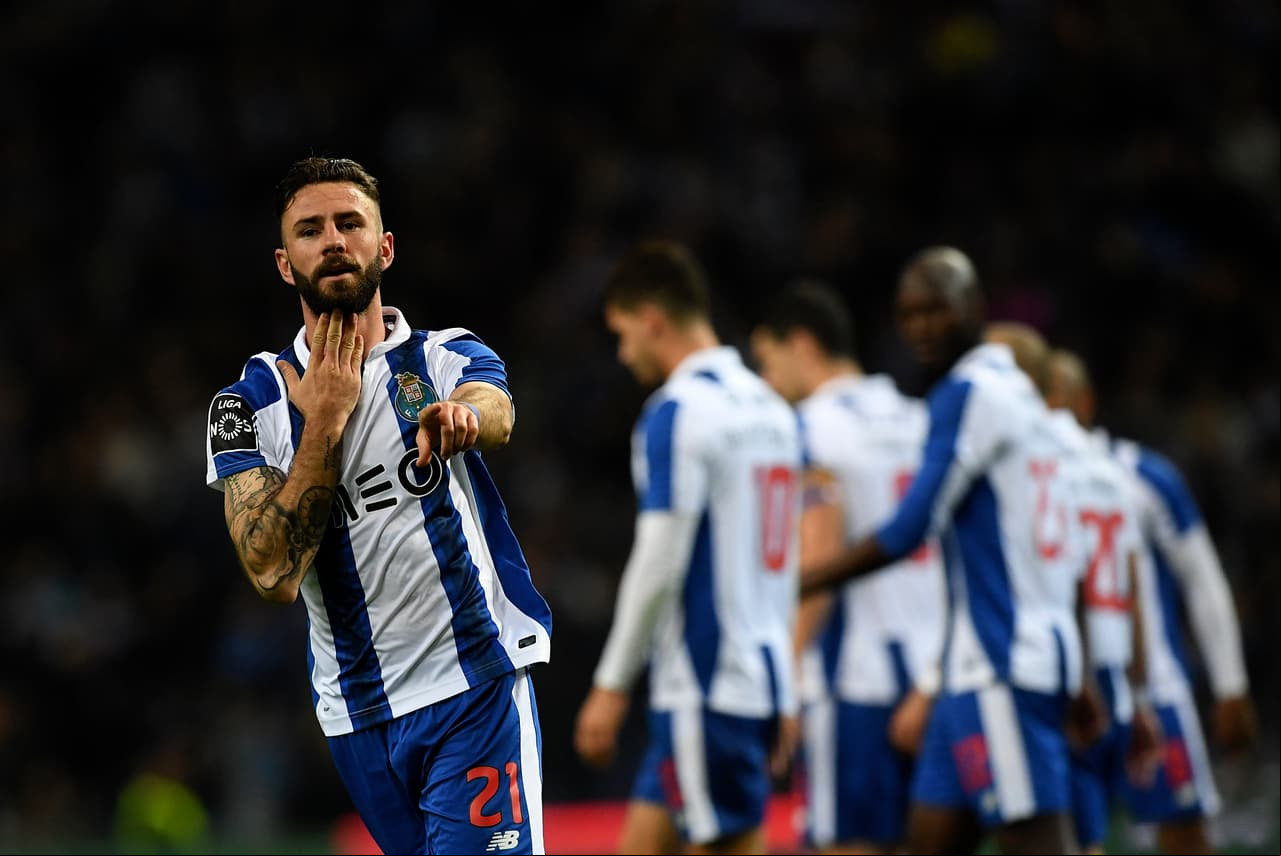 Porto's Mexican defender Miguel Layun (L) celebrates after scoring a goal during the Portuguese league football match FC Porto vs CD Nacional Funchal at the Dragao stadium in Porto on March 4, 2017. / AFP PHOTO / FRANCISCO LEONG (Photo credit should read FRANCISCO LEONG/AFP/Getty Images)