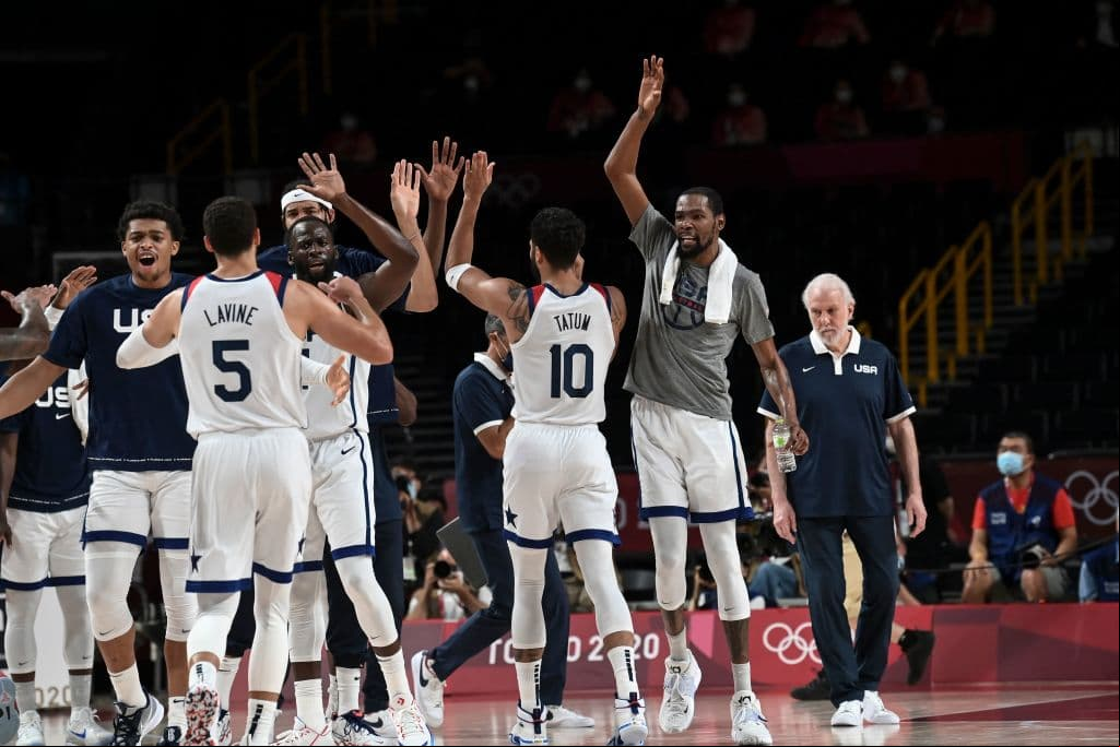 USA's players reacts during a time out in the men's semi-final basketball match between Australia and USA during the Tokyo 2020 Olympic Games at the Saitama Super Arena in Saitama on August 5, 2021. (Photo by Aris MESSINIS / AFP) (Photo by ARIS MESSINIS/AFP via Getty Images)
