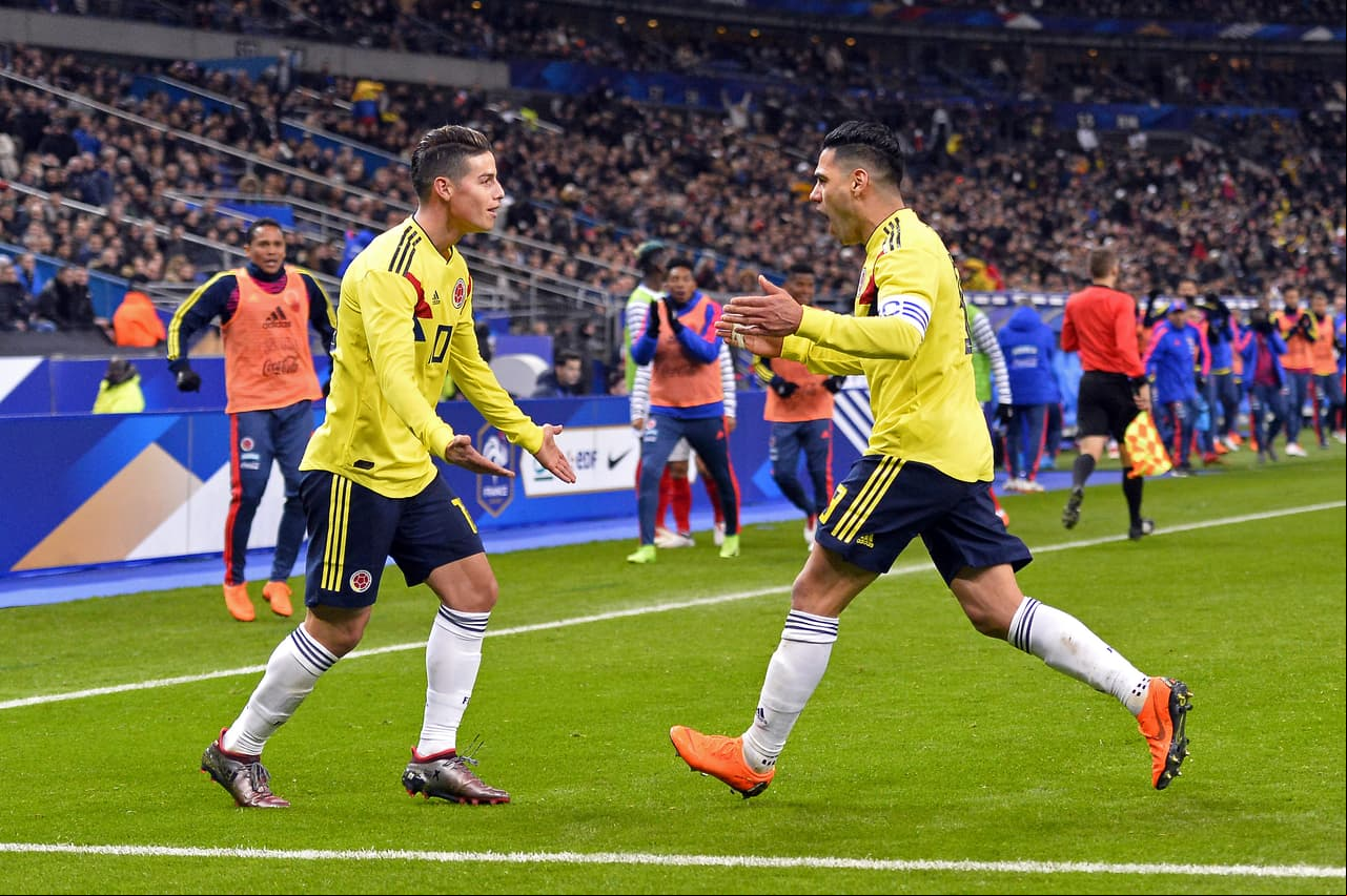 PARIS,  - MARCH 23: Radamel Falcao of Colombia is congratulated by teammate James Rodriguez after scoring during the international friendly match between  and Colombia at Stade de  on March 23, 2018 in Paris, . (Photo by Aurelien Meunier/Getty Images)