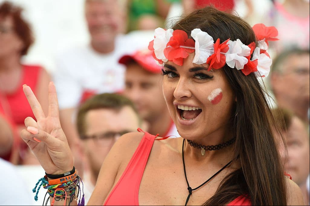 A Poland er flashes the V-sign prior to the Euro 2016 quarter-final football match between Poland and Portugal at the Stade Velodrome in Marseille on June 30, 2016. / AFP / ANNE-CHRISTINE POUJOULAT (Photo credit should read ANNE-CHRISTINE POUJOULAT/AFP/Getty Images)