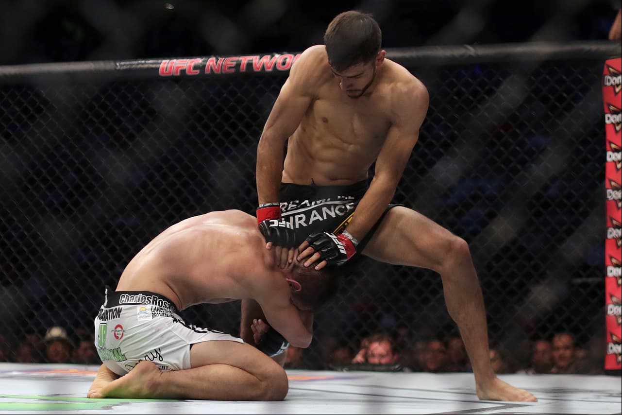 MEXICO CITY, MEXICO - JUNE 13: Charles Rosa (L) holds Yair Rodriguez (R) by the leg during a UFC Featherweight Fight between Charles Rosa and Yair Rodriguez at Arena Ciudad de Mexico on June 13, 2015 in Mexico City, Mexico. (Photo by Manuel Velasquez/LatinContent/Getty Images)