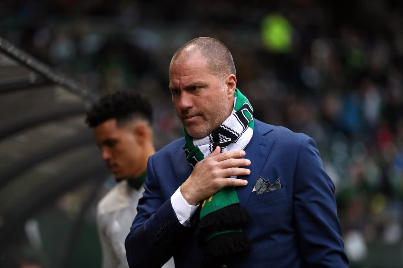 Apr 14, 2018; Portland, OR, USA; Portland Timbers head coach Giovanni Savarese blesses himself in his first game at Providence Park against Minnesota United. Mandatory Credit: Jaime Valdez-USA TODAY Sports
