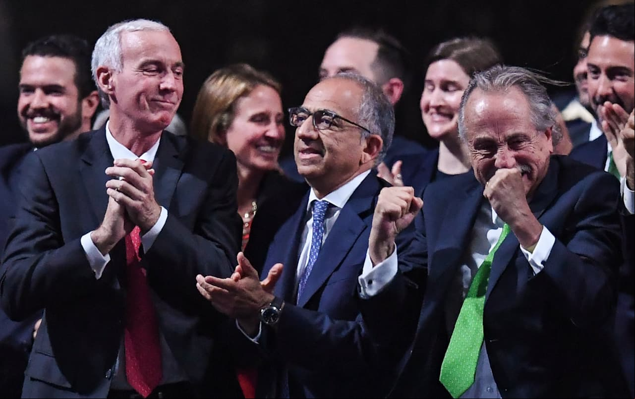 TOPSHOT - The United 2026 bid (Canada-Mexico-US) officials Carlos Cordeiro (2nd L), president of the United States Football Association, president of the Mexican Football Association Decio de Maria Serrano (2nd R) and Steve Reed (L), president of the Canadian Soccer Association, react following the announcement that the United States, Mexico and Canada will host the 2026 World Cup during the 68th FIFA Congress at the Expocentre in Moscow on June 13, 2018. (Photo by Kirill KUDRYAVTSEV / AFP) (Photo credit should read KIRILL KUDRYAVTSEV/AFP/Getty Images)